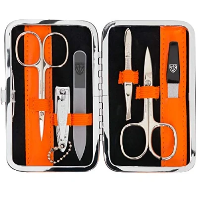 Afbeelding van DREI SCHWERTER Germany 6 delige manicureset &#039;Genova&#039; Manicure nagelset in kunstlederen etui oranje Inhoud: nagelschaar, huidschaar, nagelknipper, glazen nagelvijl, pincet, saffier nagelvijl