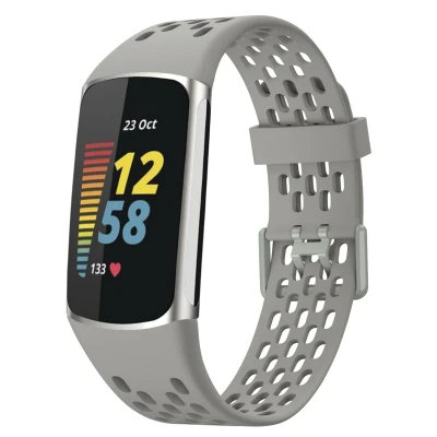 Afbeelding van Siliconen sport bandje met gaatjes voor de Fitbit Charge 5 / 6 Grijs imoshion En TPU (zacht)