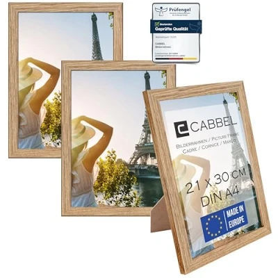 Afbeelding van CABBEL Set van 3 fotolijsten DIN A4, 21x30 cm, MDF houten lijst, met onbreekbaar acrylglas, ideaal voor collages, portretten en oorkonden, eik