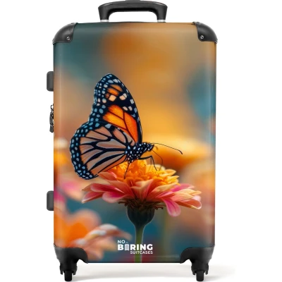 Afbeelding van NoBoringSuitcases.com® Koffer groot Rolkoffer lichtgewicht Vlinder op roze bloem Reiskoffer met 4 wielen Grote trolley XL 20 kg bagage