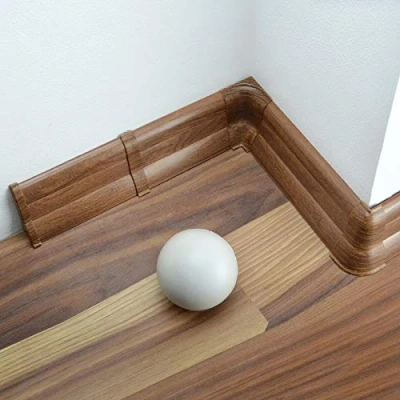 Afbeelding van [DQ PP] PVC bevestigingspunt rechts voor plinten in laminaat look, 62 mm, tabak eik