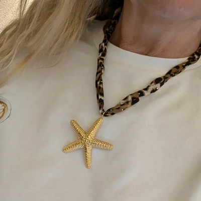 Afbeelding van Casa Jadel Ketting panterstof met gouden statement zeester