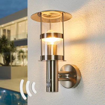 Afbeelding van Lindby Wandlampen buiten 1licht roestvrij staal, polycarbonaat H: 34 cm E27 transparant