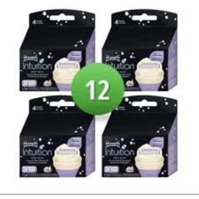 Afbeelding van Wilkinson Intuition Dry Skin Cocos Scheermesjes Voordeelverpakking 4 x 3 Stuks