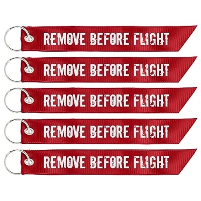 Afbeelding van REMOVE BEFORE FLIGHT ritstrekker sleutelhanger 5X