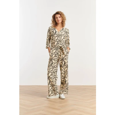 Afbeelding van Smashed Lemon 25241 Jumpsuit Met Zand En Zwarte Bloemenprint In Travel L