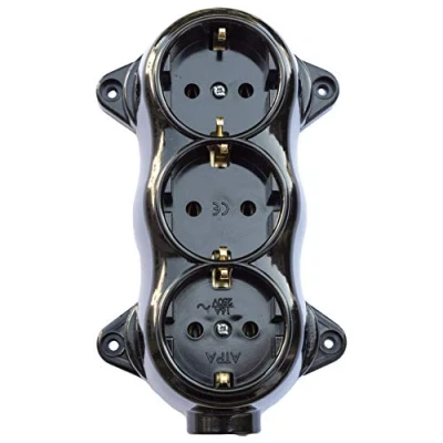 Afbeelding van Stopcontact FEST RETRO 3 voudige 16A 250V opbouw montage messing dik zwart bakeliet look oud