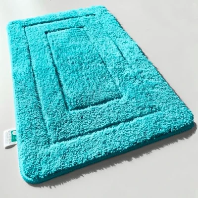Afbeelding van KARAT badmat Atlantis extra pluizig en sneldrogend badkamertapijt met antislip achterkant douchemat (turquoise, 60 x 100 cm)
