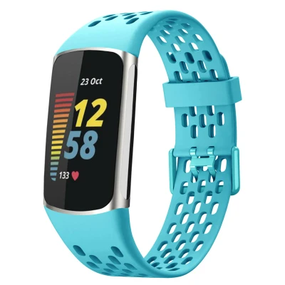 Afbeelding van Siliconen sport bandje met gaatjes voor de Fitbit Charge 5 / 6 Turquoise imoshion En TPU (zacht)