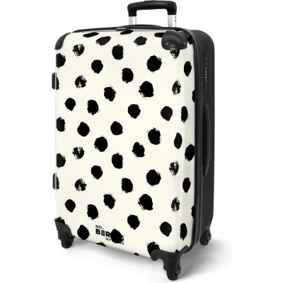 Afbeelding van NoBoringSuitcases.com® Koffer groot Rolkoffer lichtgewicht Wit met zwarte stippen Reiskoffer 4 wielen Grote trolley XL 20 kg bagage