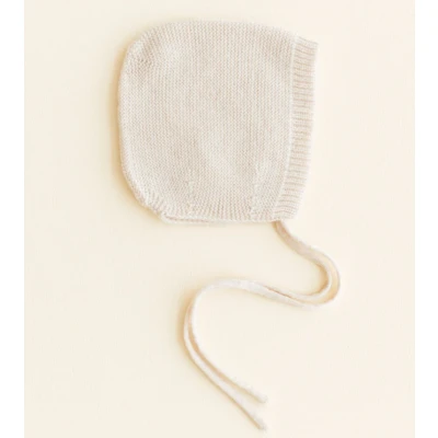 Afbeelding van Hvid Mutsje van merino wol cream maat M (4 12 maanden)