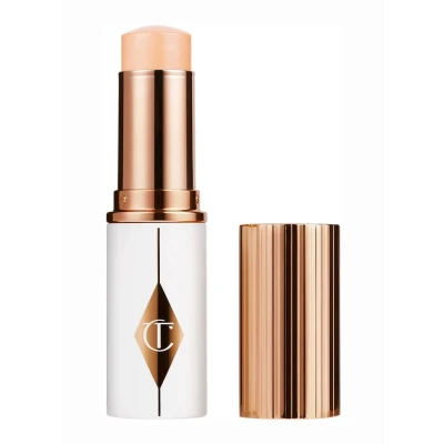 Afbeelding van Charlotte Tilbury Unreal Skin Sheer Glow Tint Hydrating Foundation Stick 4 Fair 9 gram