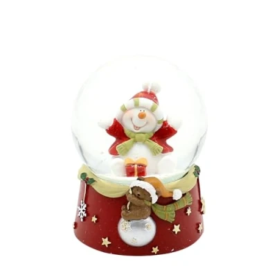Afbeelding van Sneeuwbol Vrolijke sneeuwpop op rode basis met teddyberen, L/B/H/Ø bal 6,5 x 7 9 cm Ø
