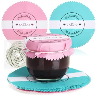 Afbeelding van COM FOUR® 30x decoratieve kanten servetten voor inmaakpotten jam met elastiekjes decoratie glazen (30 stuks roze/turquoise)
