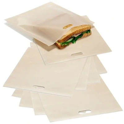 Afbeelding van COM FOUR® 10x Teflon toastzakjes, herbruikbare non stick toastzakjes voor kaastoast in de broodrooster en tosti ijzer onderhoudsvriendelijk, hittebestendig (10 stuks Teflon)