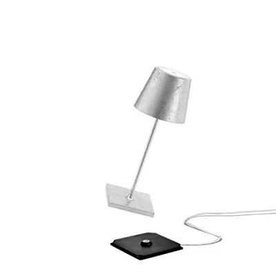 Afbeelding van Zafferano Poldina Pro Mini, Draadloze LED tafellamp met oplaadbare batterij, Touchdimmer, draadloos opladen, IP20 Binnengebruik, H30cm metallic bladafwerking, handgemaakt, zilverkleur