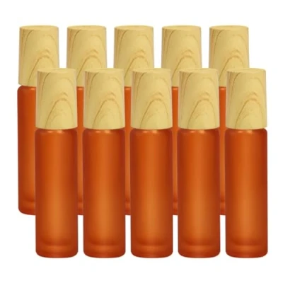 Afbeelding van Frosted glazen etherische olie roller flessen, 10 stuks oranje matglazen flessen met houtnerf dop &amp; roestvrij stalen ballen olie, ml lege parfumflessen (oranje)
