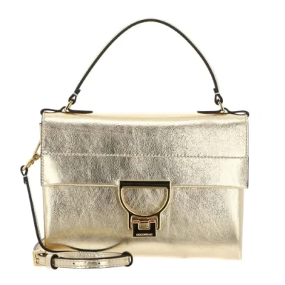 Afbeelding van COCCINELLE Leren Handtas Schoudertas Arlettis Smooth Metal Handbag Golden Goudkleurig