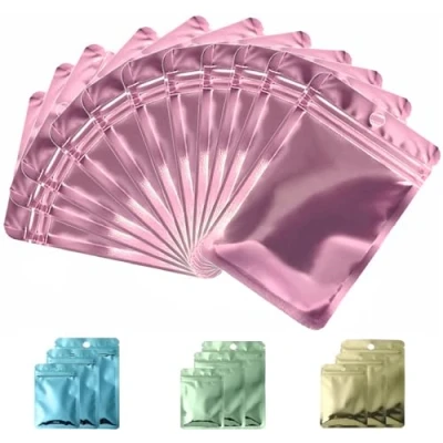 Afbeelding van Rimiko 50 stuks Hersluitbare Aluminium Ritssluiting Zakken, Mylar Folie Zakjes met Rits, Luchtdichte Kleine Platte Zakken voor het Bewaren van Voorwerpen en Voedsel (Metallic Roze, 10,5 x 15 cm)