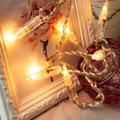 Afbeelding van Hellum Kerstboomverlichting voor binnen met 10 warm witte lampjes Kerstversiering, moderne transparante kabel schakelaar, lengte 1,35 m Woonkamer decoratie, 831160, dennenboom verlichting