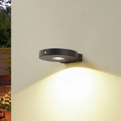 Afbeelding van Lucande LED wandlamp Tavon, rond, zwart, sensor