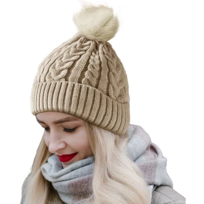 Afbeelding van CALIYO Beanie Muts Wintermuts Dames Warme Mutsen met Imitatiebont Pompon Gebreide Skimutsen Gevoerd Wol Beige