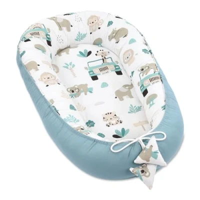 Afbeelding van Babynest Cocoon newborn 90 x 50 cm Handgemaakt knuffelig babynestje van katoen Afrika Blauw