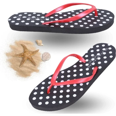 Afbeelding van Zwarte teenslippers met stippen