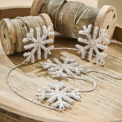 Afbeelding van LOBERON Guirlande Snowflakes zilverkleurig