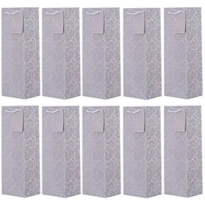 Afbeelding van Set van 10 cadeautasjes zilveren flestasjes voor wijn en ook mousserende of champagne 36x12x10 cm