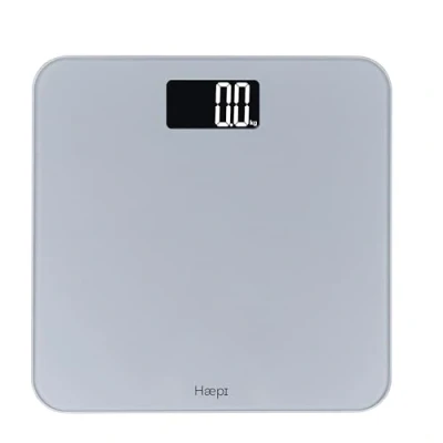 Afbeelding van Haepi Elektronische personenweegschaal Groot verlicht scherm voor perfecte leesbaarheid Modern en elegant design Maximale capaciteit van 180 kg 15 jaar garantie Inclusief batterijen Metallic Silver