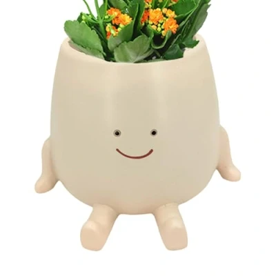 Afbeelding van zittende bloempot, hars vetplanten, bloempotten, plantenpot in menselijke vorm, nieuwe hoofdplantenpot, tuinpotten voor tafel, plank, vensterbank