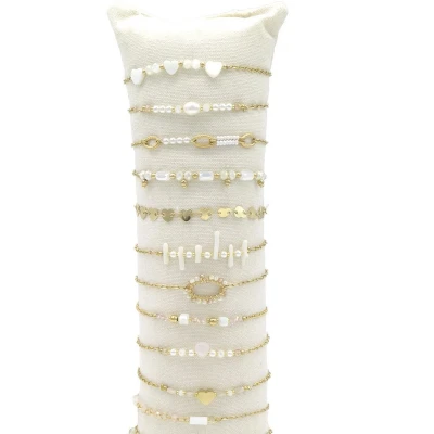Afbeelding van Armbandjes RVS set van 12 goudkleurig parels kralen