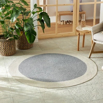 Afbeelding van Rond Jute Buitenkleed Braids Creme 123vloerkleed.nl is de online webshop voor vloerkleden en woonaccessoires.