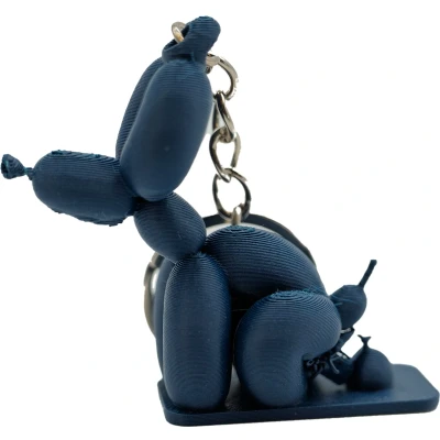Afbeelding van Poepende ballon hond sleutelhanger Terracotta