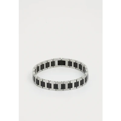 Afbeelding van Lacoste METROPOLE Collectie Schakelarmband in roestvrij staal, versierd met petit piqué patroon Verkrijgbaar voor hem en haar