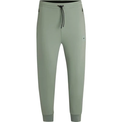 Afbeelding van HUGO BOSS heren Hadiko tapered fit joggingbroek met logo in de kleur Legergroen, maat: S