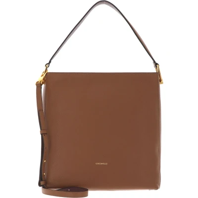 Afbeelding van COCCINELLE Leren Handtas Schoudertas Liya Handbag Nocciola / Carruba Lichtbruin