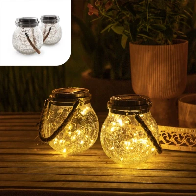 Afbeelding van Gadgy Solar Lantaarn Craquelé Glas met 20 fairy lights 2 st tuinverlichting dag/nacht sensor 13.5 x Ø12 cm