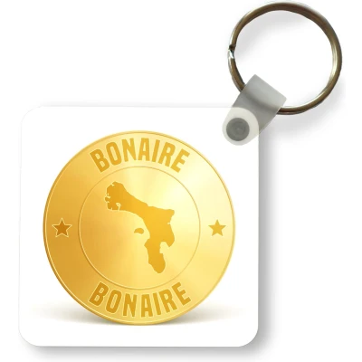 Afbeelding van Sleutelhanger Uitdeelcadeautjes een illustratie van gouden munt met Bonaire erop Plastic