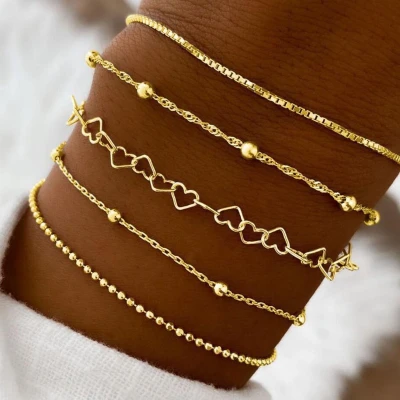 Afbeelding van Jomide Armbandjes Set Hart Goudkleurig 5 stuks