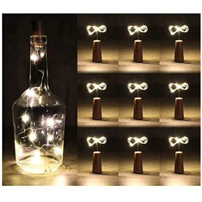 Afbeelding van COM FOUR® 9x LED flessenlicht kurkverlichting voor binnen, lege wijn en champagneflessen mini lampjes met werking op batterij (09 stuks)