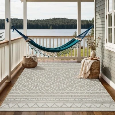 Afbeelding van Vloerkleed voor buiten of balkon en terras In beige 80 x150 cm Tapijt geschikt Outdoor Rechthoekig Weer UV bestendig Tuintapijt Buitentapijt CALGARY kleed by The Carpet