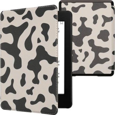 Afbeelding van kwmobile E reader hoesje geschikt voor Amazon Kindle Paperwhite 11. Generation 2021 hoes flip case met magnetische sluiting Ereader cover Koeien Patroon design in zwart / wit