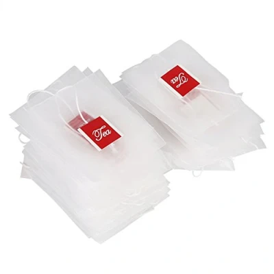 Afbeelding van 100 stuks nieuwe stijl nylon lege thee infuser kruidenkruid filter zeef zakken met string huishouden