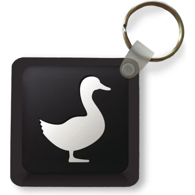 Afbeelding van Sleutelhanger een illustratie van eend op zwarte achtergrond Plastic Rond Uitdeelcadeautjes