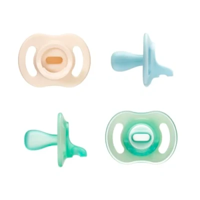 Afbeelding van Tommee Tippee Ultralichte StayPut en Night Glow fopspeen, eendelig siliconen design, zacht huidgevoel, 0 6 maanden, verpakking van 4 stuks