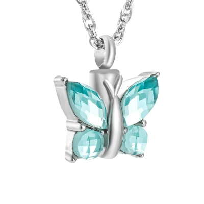 Afbeelding van Dutch Duvall Ashanger vlinder met ketting Assieraad turquoise van RVS inclusief en vulset