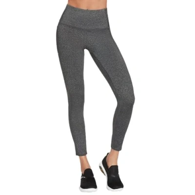 Afbeelding van Skechers Go Walk dames legging. Gemaakt van nylon en spandex mix stof. Beschikt over een brede band hoge taille. Afgewerkt met vakje aan de zijkanten Grijs Maat S