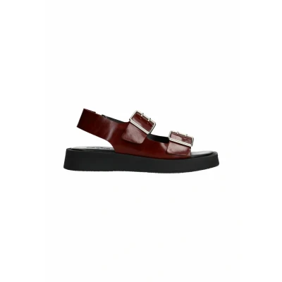 Afbeelding van Sacha Dames Bruine leren plateau sandalen met zilverkleurige buckles Maat 36